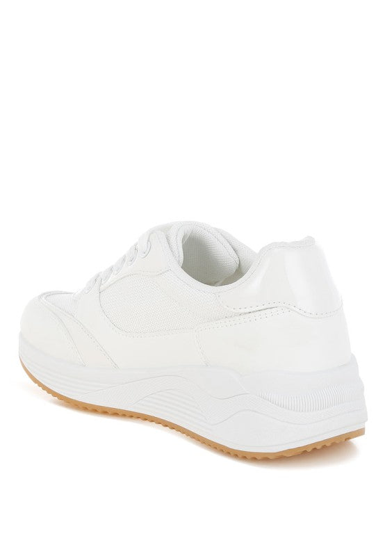 White chunky lace-up sneaker with textured upper and cushioned collar
