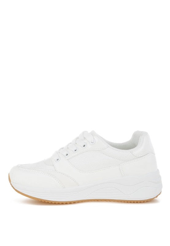 White chunky lace-up sneaker with perforated trim and gum-toned outsole