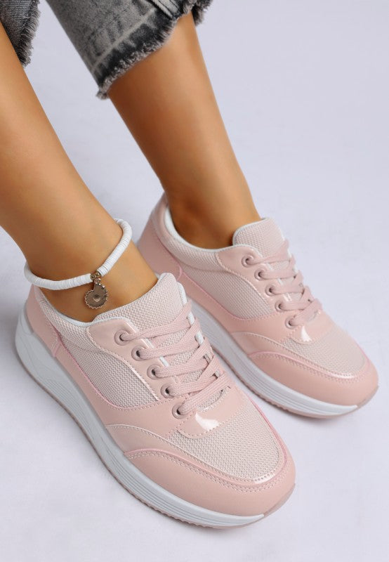 Pink chunky mesh lace-up sneakers, white laces and thick white sole.