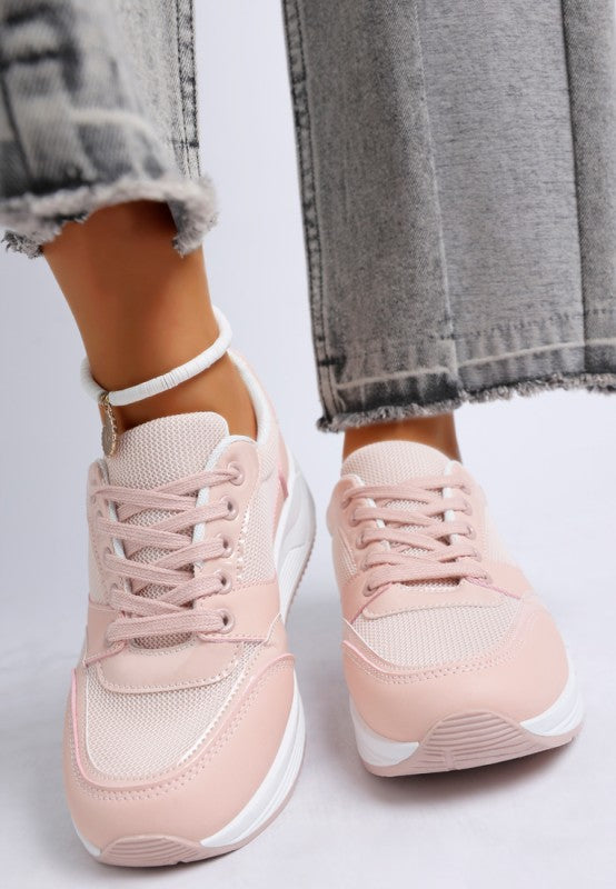 Pink lace-up sneakers with mesh upper, white midsole and padded heel collar.