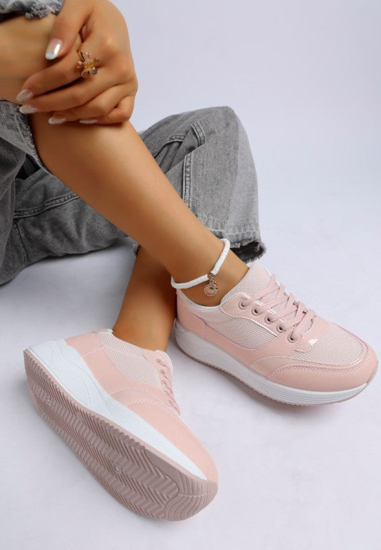 Pink lace-up sneakers with mesh upper, white accent midsole and cushioned collar.