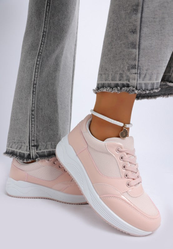 Pink mesh lace-up sneakers with thick treaded sole and white midsole.