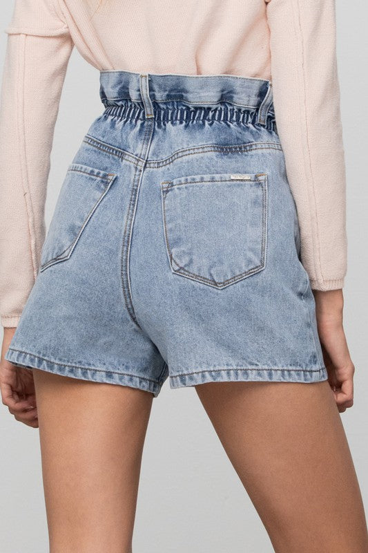 Light-wash denim shorts with high-rise elastic waistband and large patch back pockets