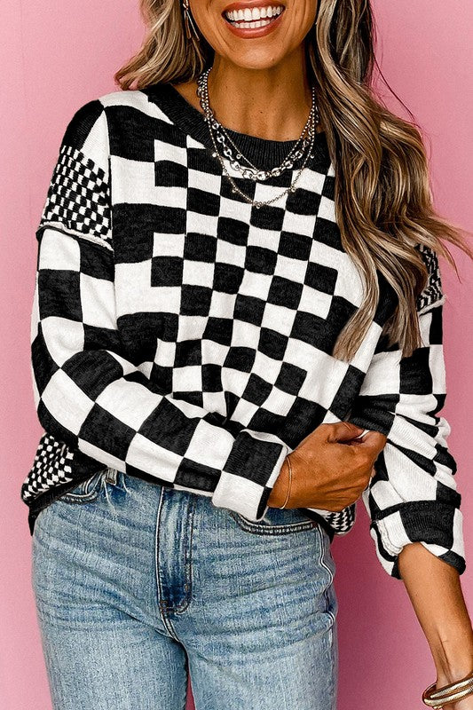 Black checkered drop-shoulder pullover sweater, crew neck, long sleeves