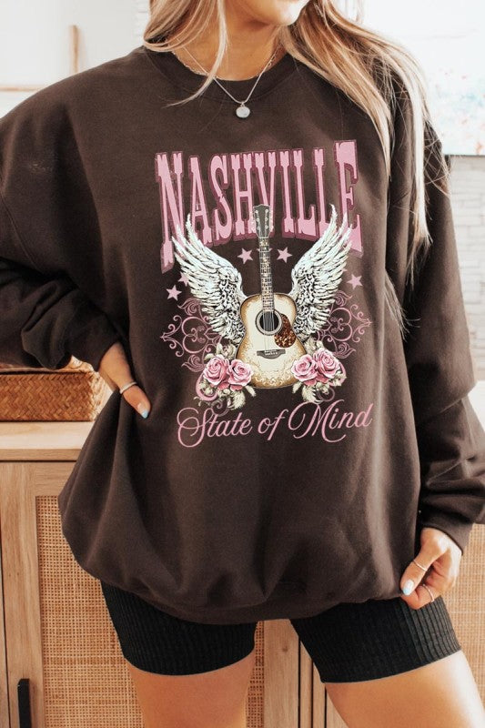 Black sweatshirt with Nashville graphic: guitar and wings, “State of Mind” script