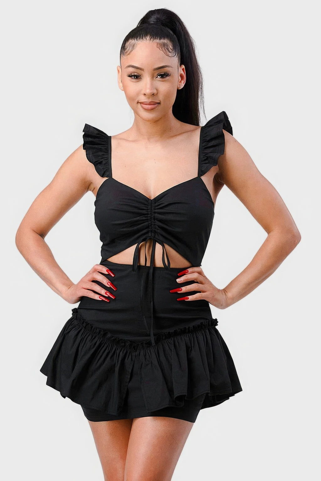 Black mini dress with sweetheart neckline, ruched bodice, drawstring bow cutout, flutter sleeves
