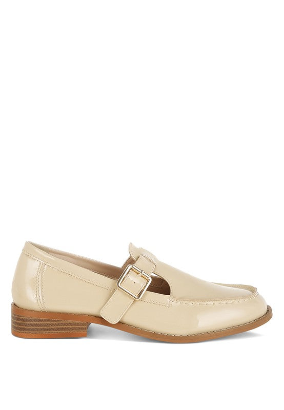 Beige patent Mary Jane loafers, side view with metal buckle