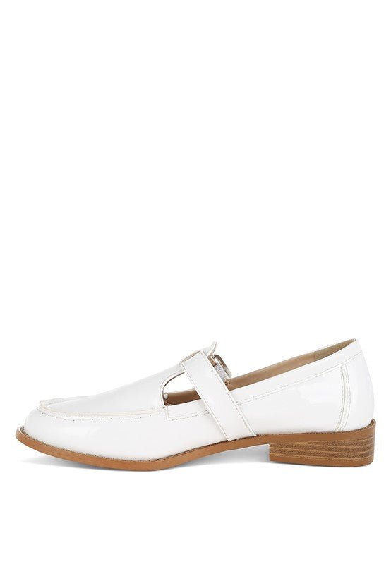 White patent Mary Jane loafers, side view with strap and stacked block heel