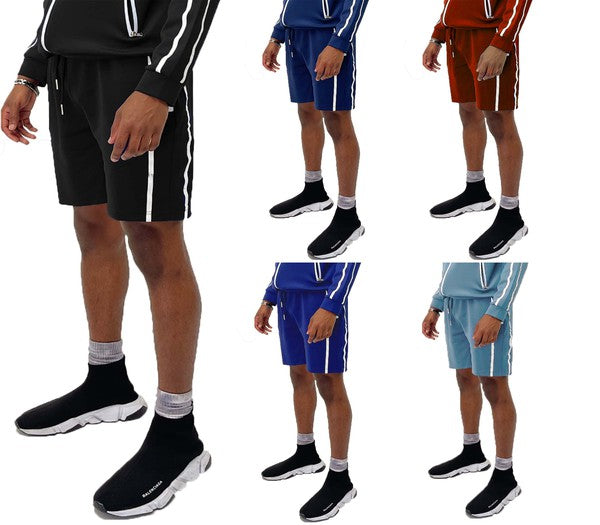 Multi-color view: taped stripe shorts in black, royal blue, red, and light blue.