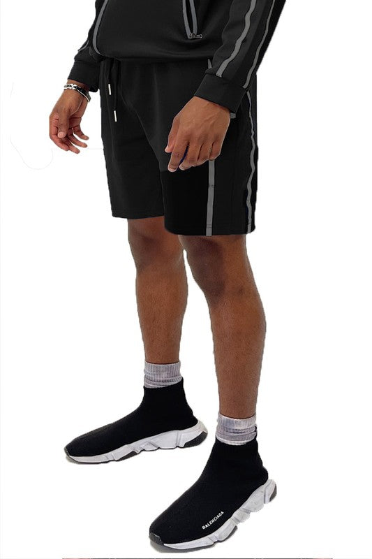 Black taped stripe shorts with side vertical stripes and drawstring waist.