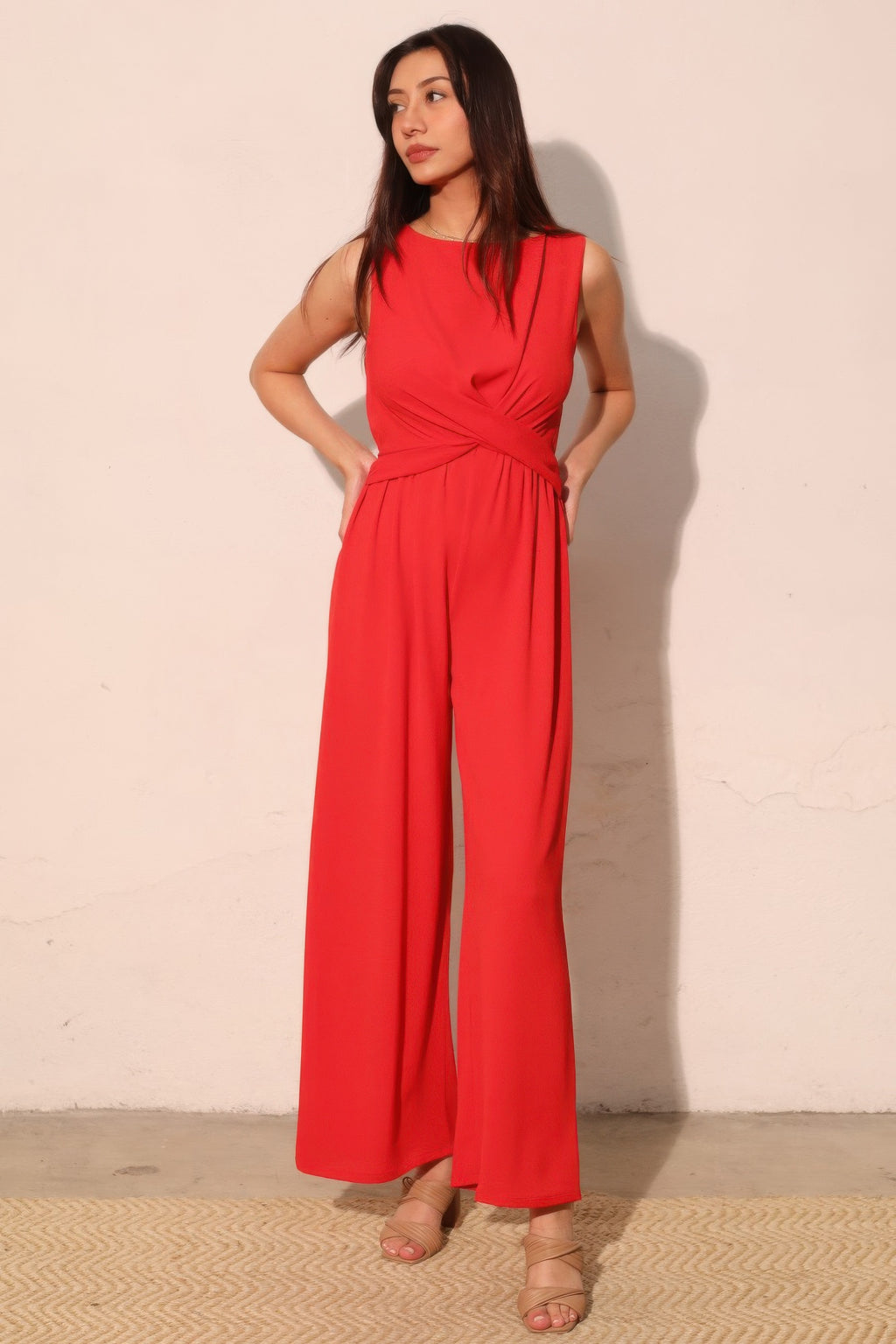 True red twist-front jumpsuit, sleeveless wide-leg trousers
