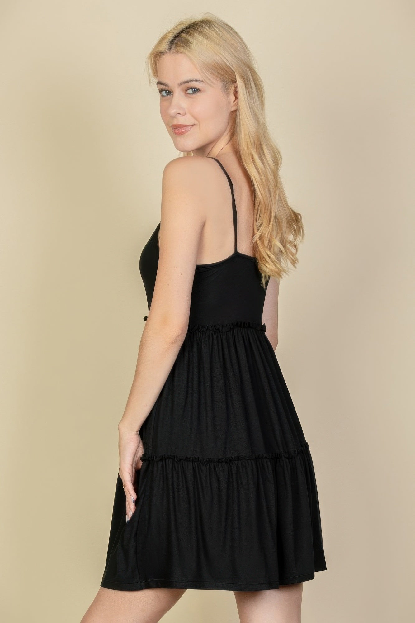 Black tiered cami swing dress side profile with tiered ruffle panels