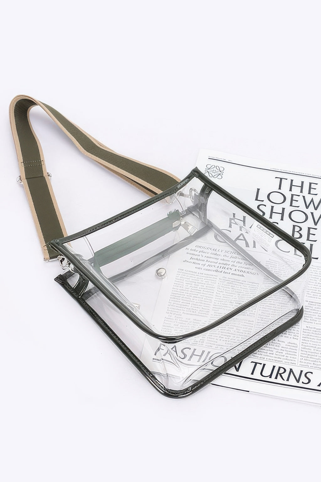 Bolsa escolar transparente con correa cruzada, borde negro y correa verde