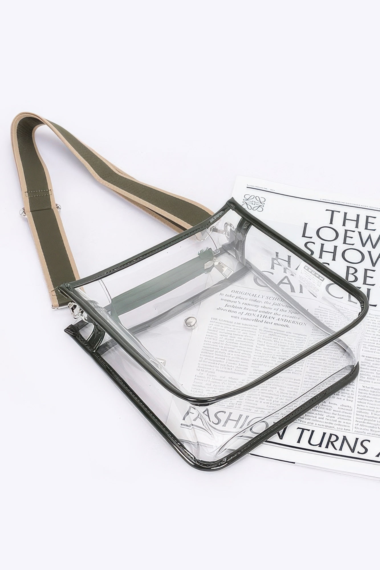 Bolsa escolar transparente con correa cruzada, borde negro y correa verde