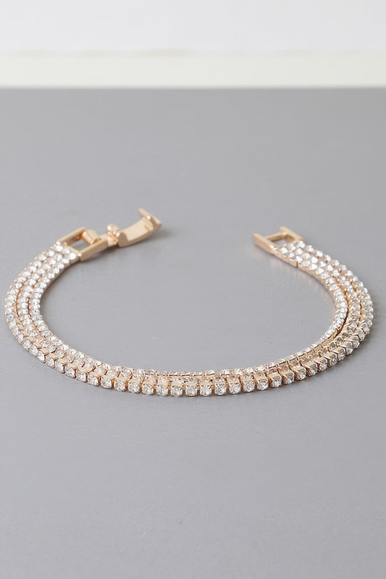 Triple Cubic Jewel Bracelet, gold clear tone, three rows of square-like clear stones