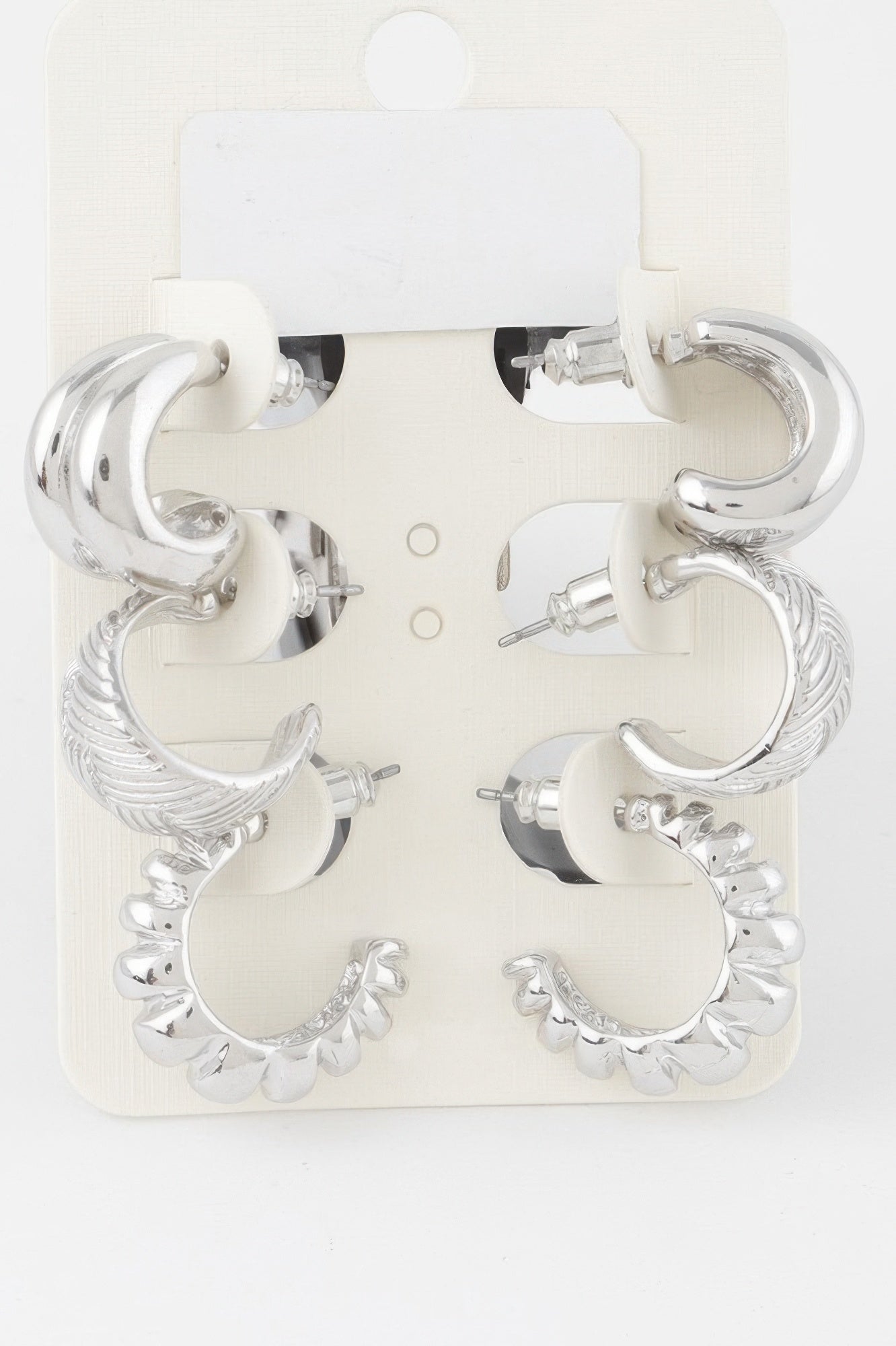 Silver triple hoop earrings set with three layered hoop sizes