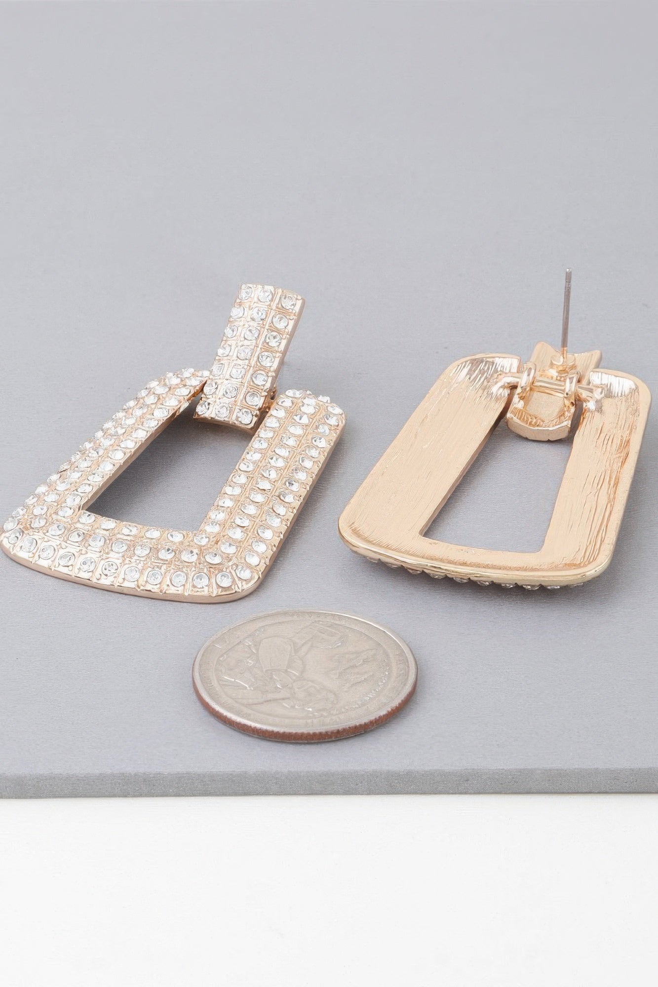 Triple rhinestone frame earrings, gold-tone clear stones; stud-back view