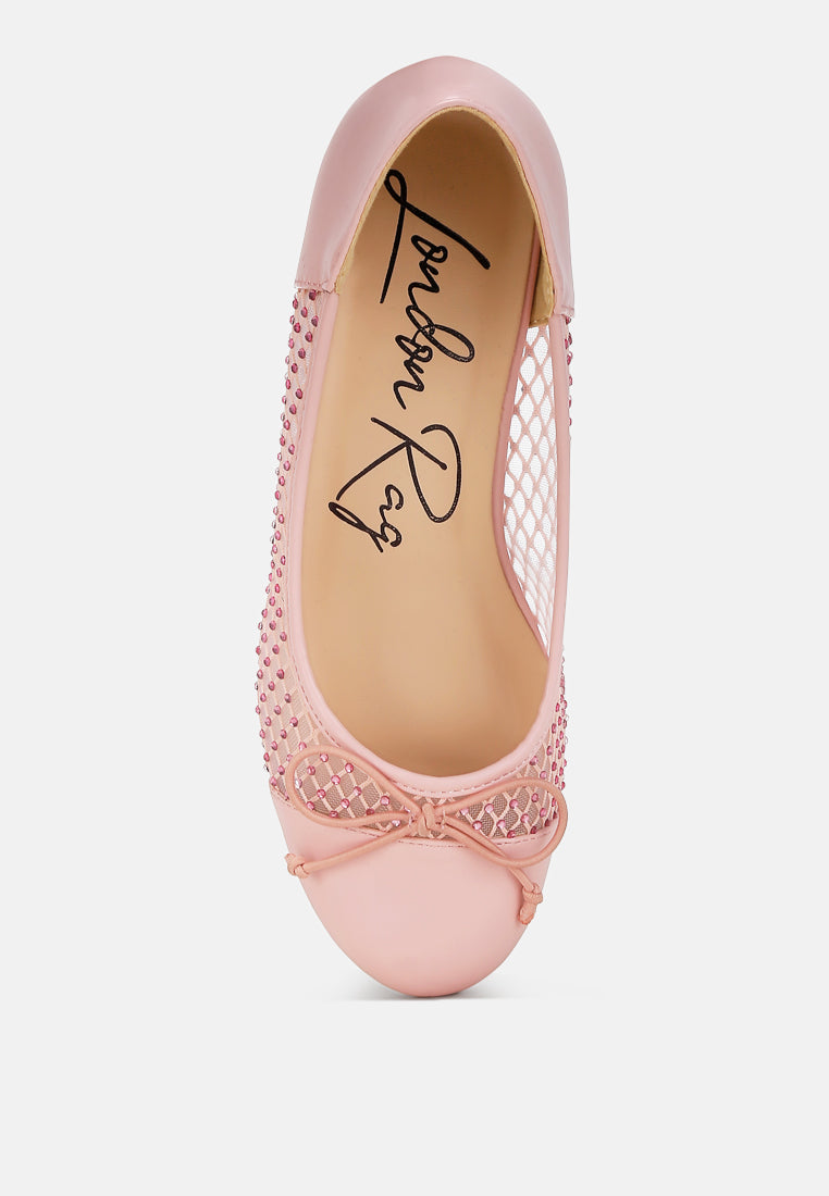 Pink mesh ballerina flats showing insole and bow detail at top