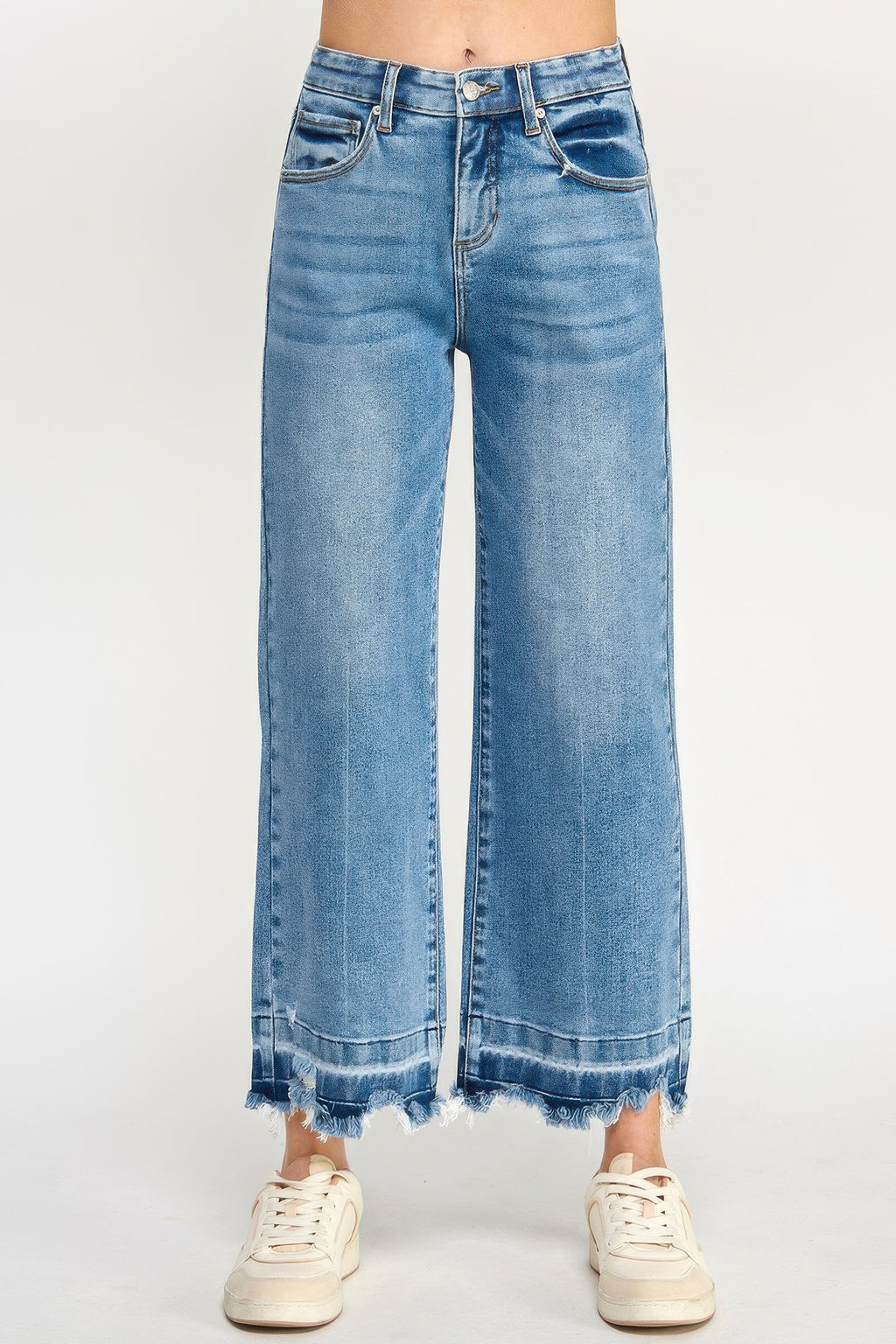High-rise wide-leg jeans in blue wash with frayed released hem