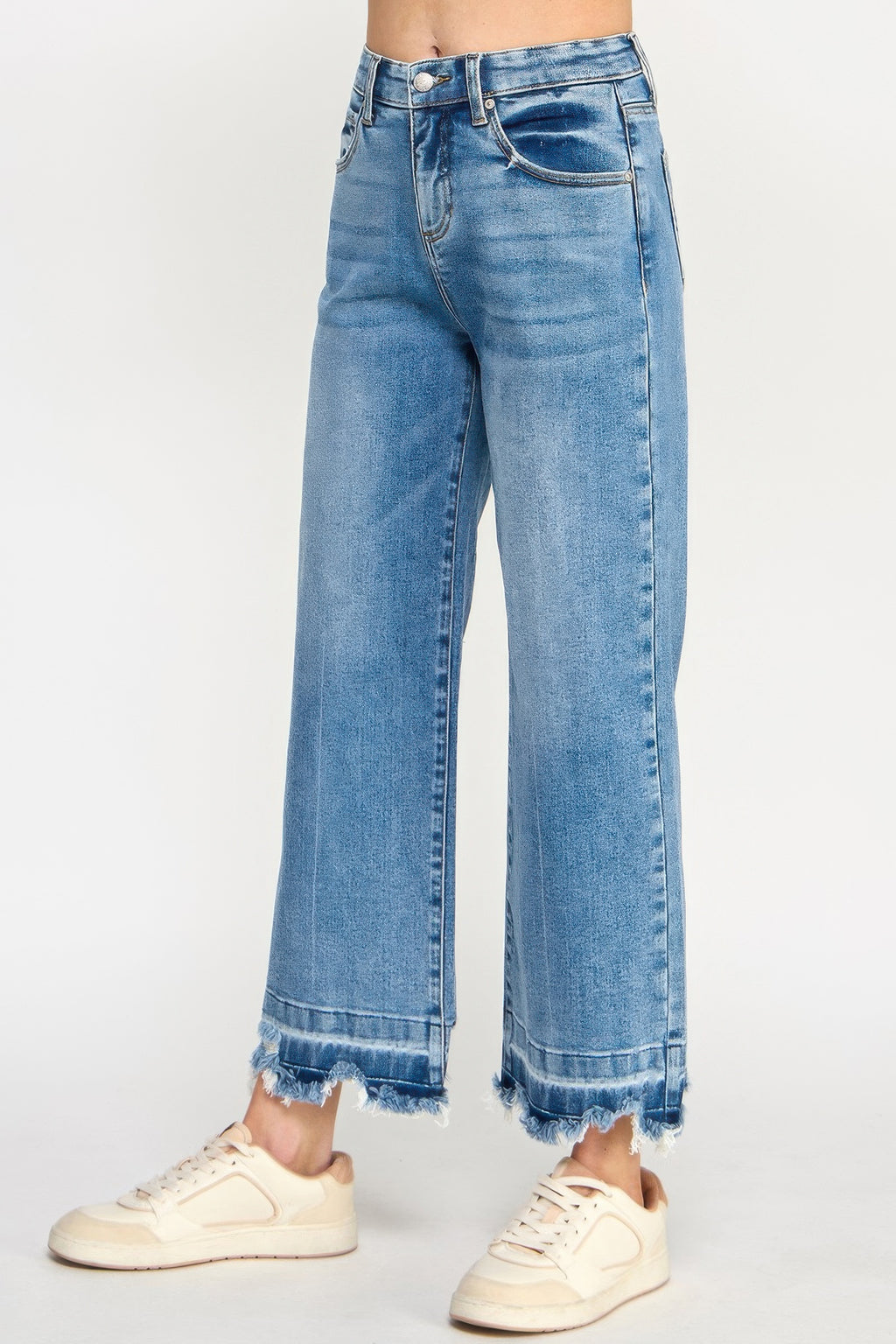 Light blue high-rise wide-leg jeans with frayed cuff hem