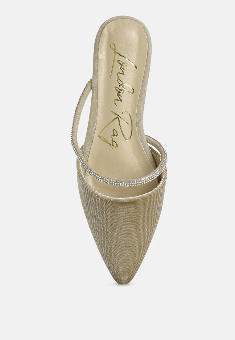 Latte velvet mule close-up with diamante-trim strap; cream insole visible