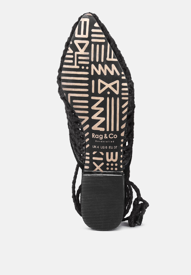 Black mule outsole and inner sole with tie strap at the heel
