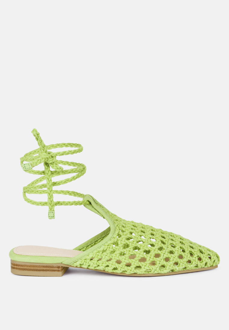Green woven tie-up mule flats with perforated knit upper and low block heel