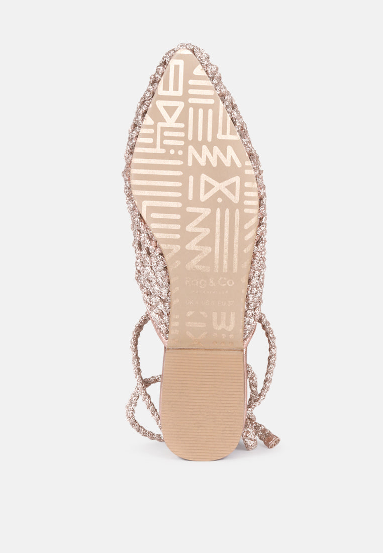 Rose Gold mule outsole with woven upper straps and low block heel