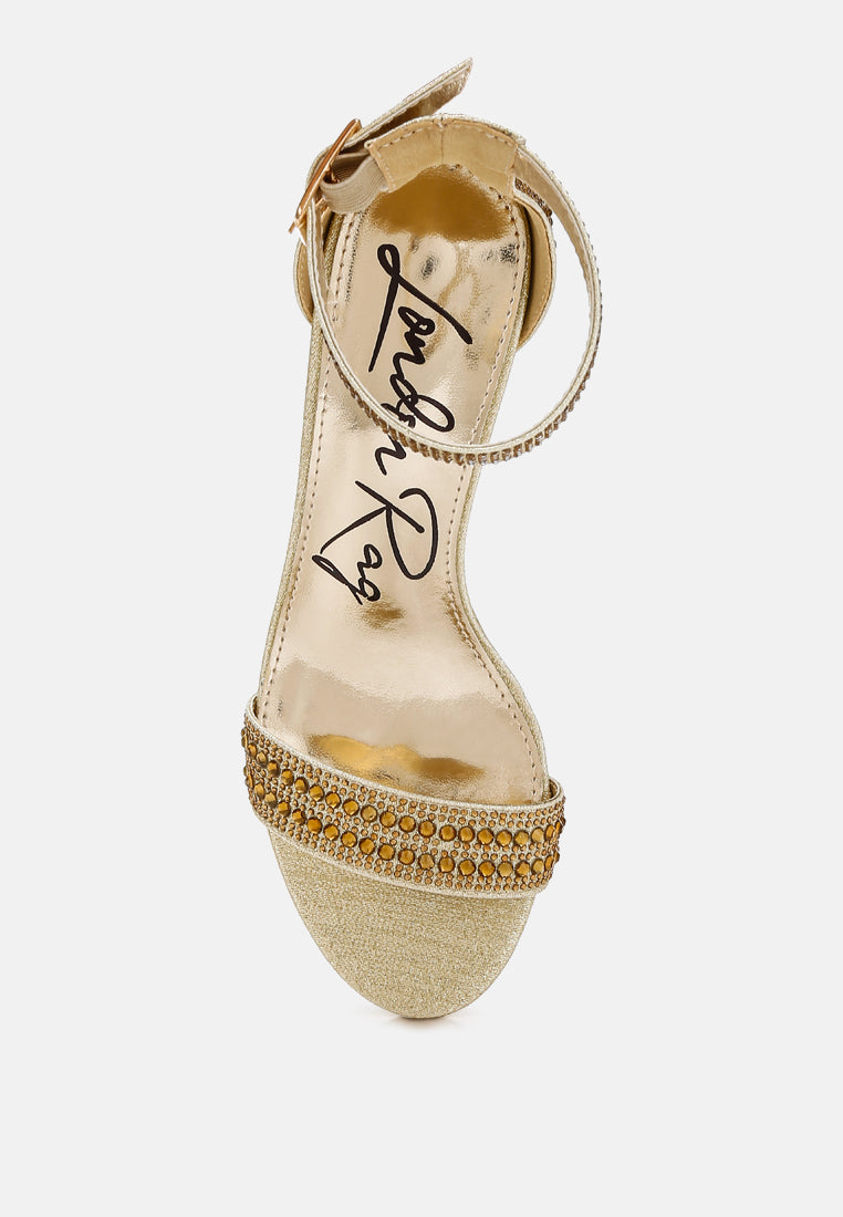 Gold rhinestone block sandals with ankle strap, front view