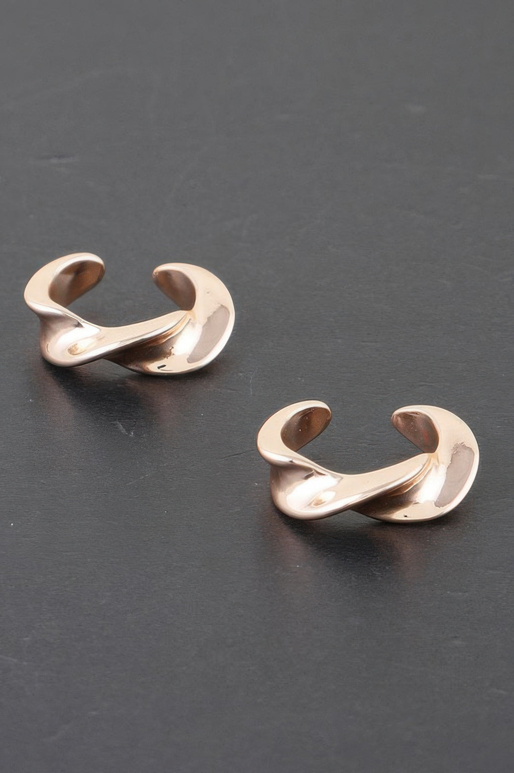 Twist of Elegance plated hoop earrings, gold-tone twisted open design