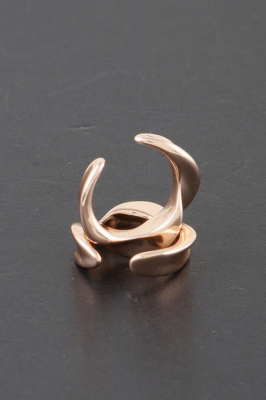 Gold-tone twisted open hoop earrings with glossy plated finish