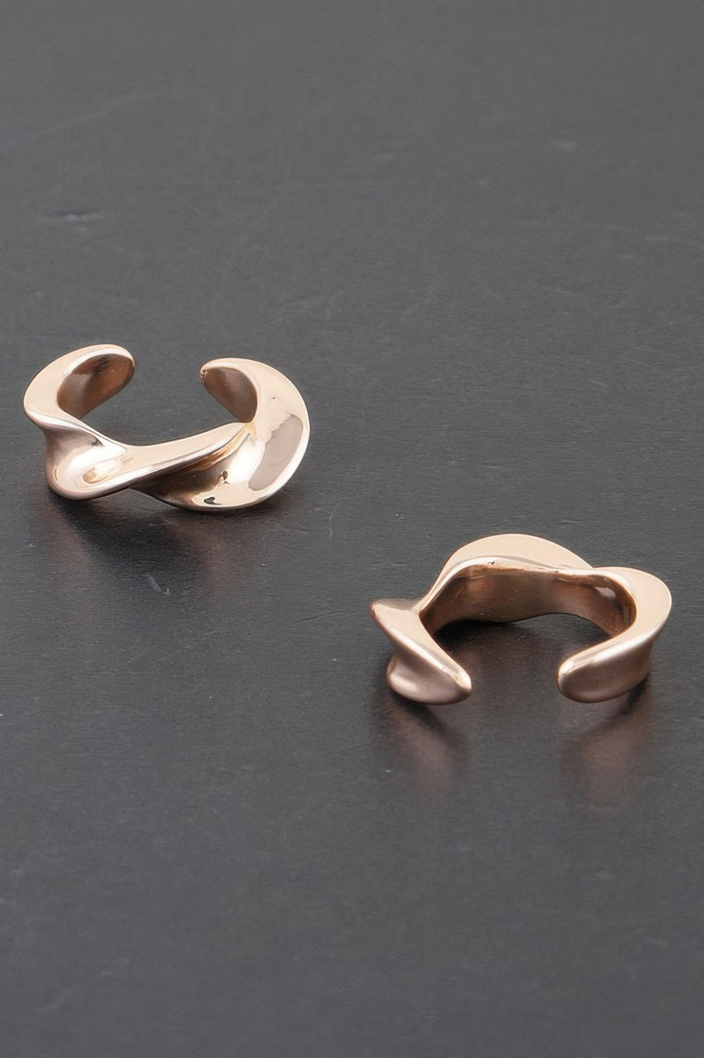Twist of Elegance plated earrings, gold-tone sculpted C-shaped twist