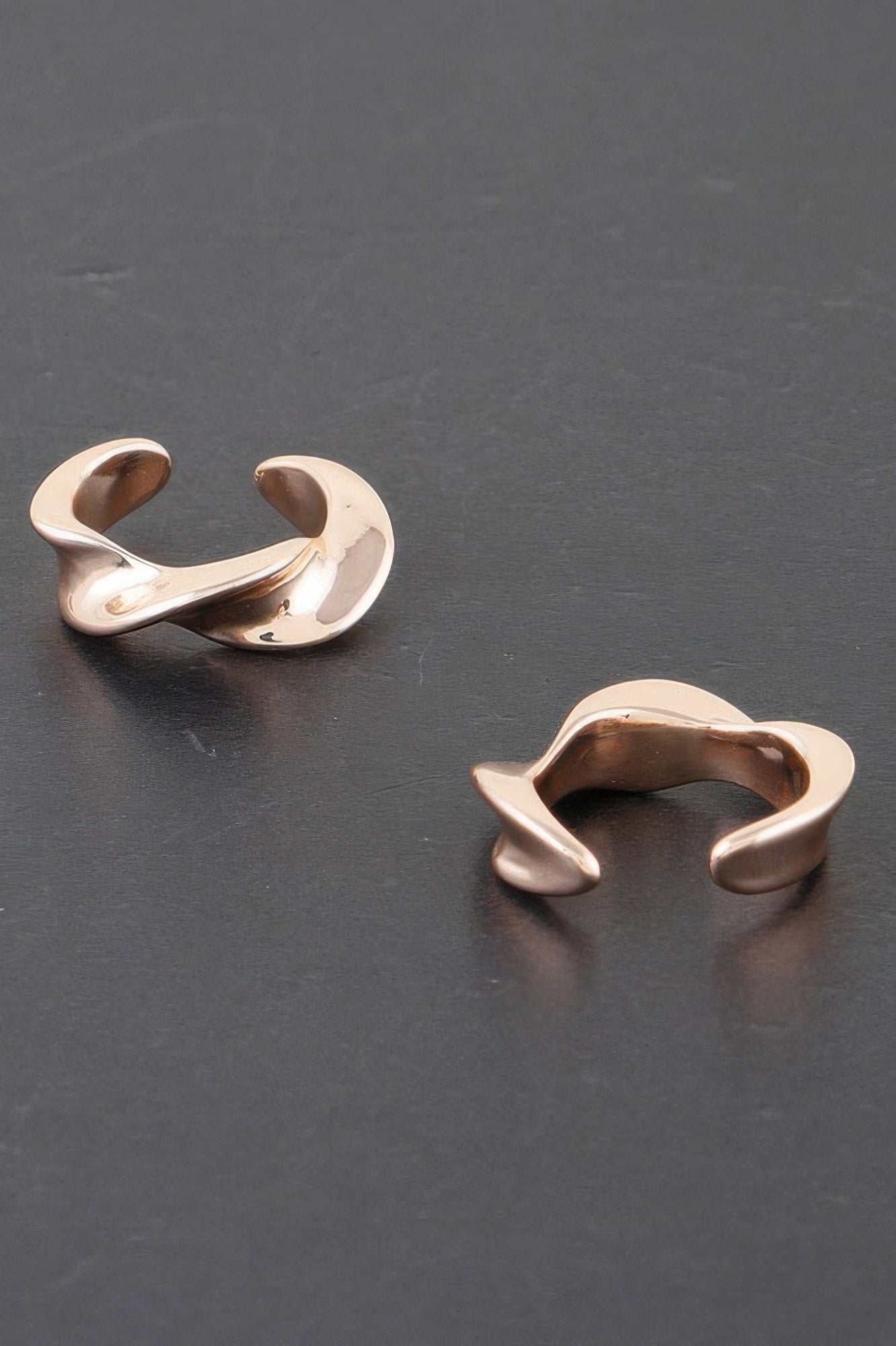 Twist of Elegance plated earrings, gold-tone sculpted C-shaped twist