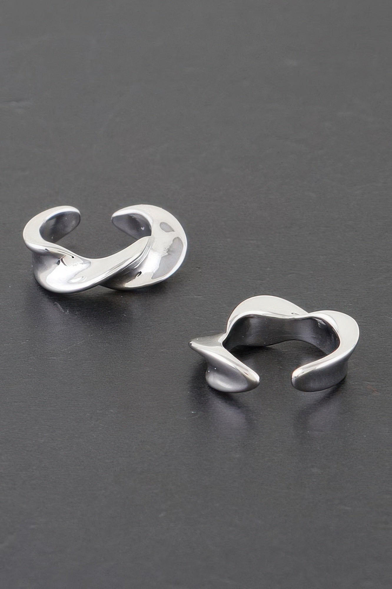 Twist of Elegance plated hoop earrings, silver-tone twisted open design
