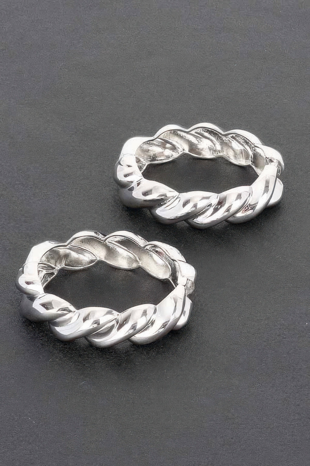 Twist & Shine bracelet, silver twisted chain links, front and side angle