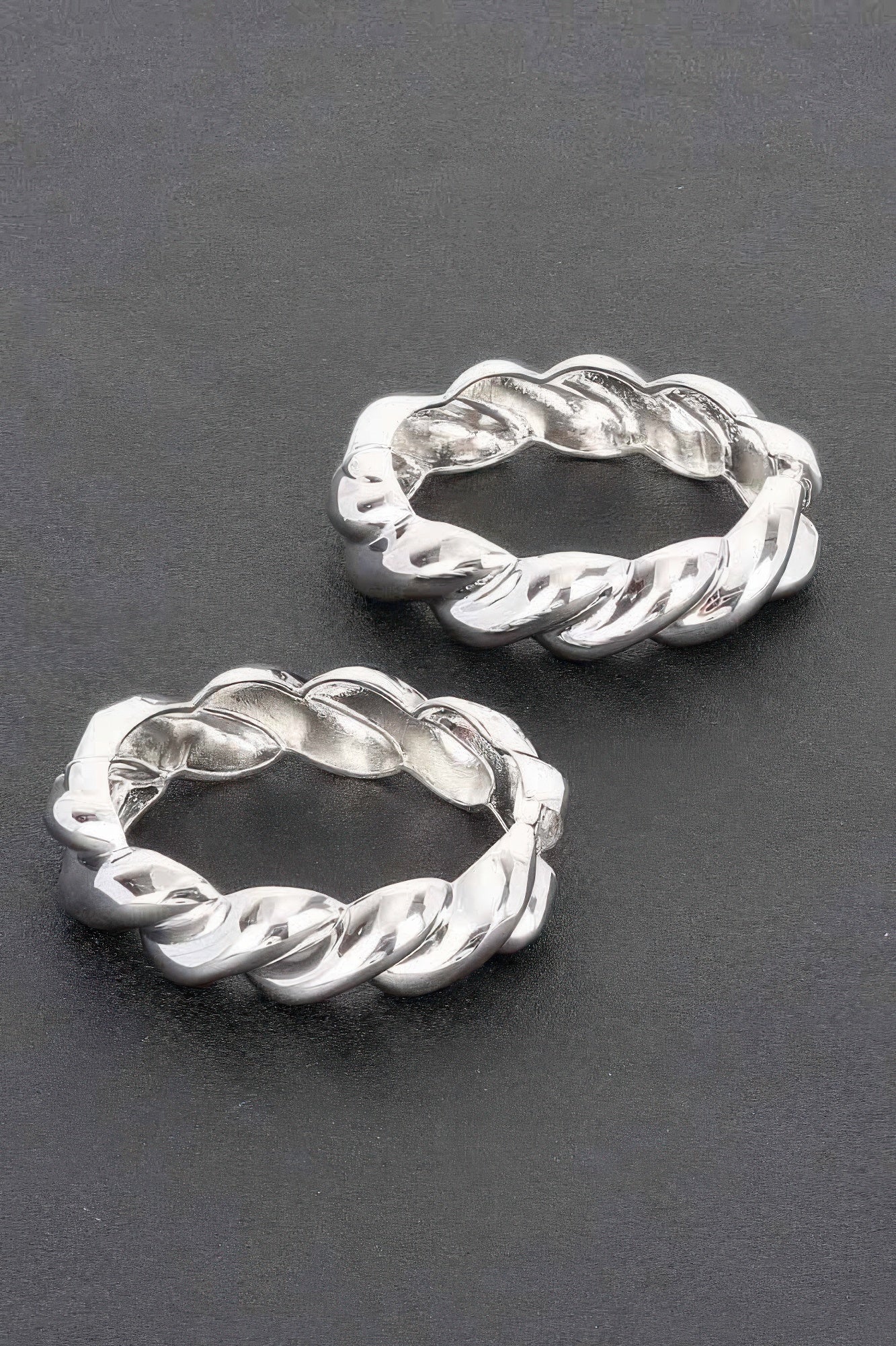 Twist & Shine bracelet, silver twisted chain links, front and side angle
