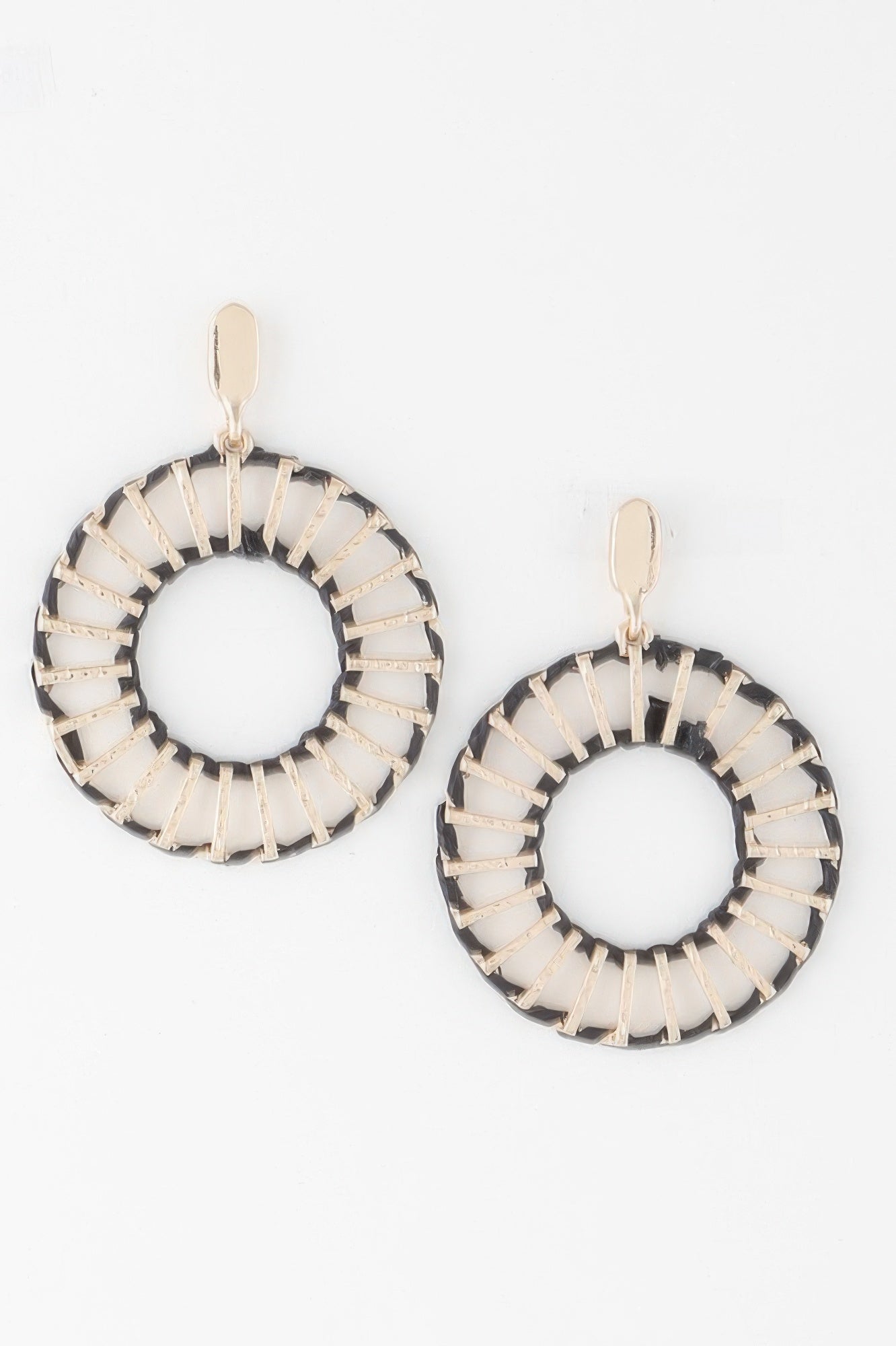 Twisted woven disk earrings in black with gold tone and cream striped detail