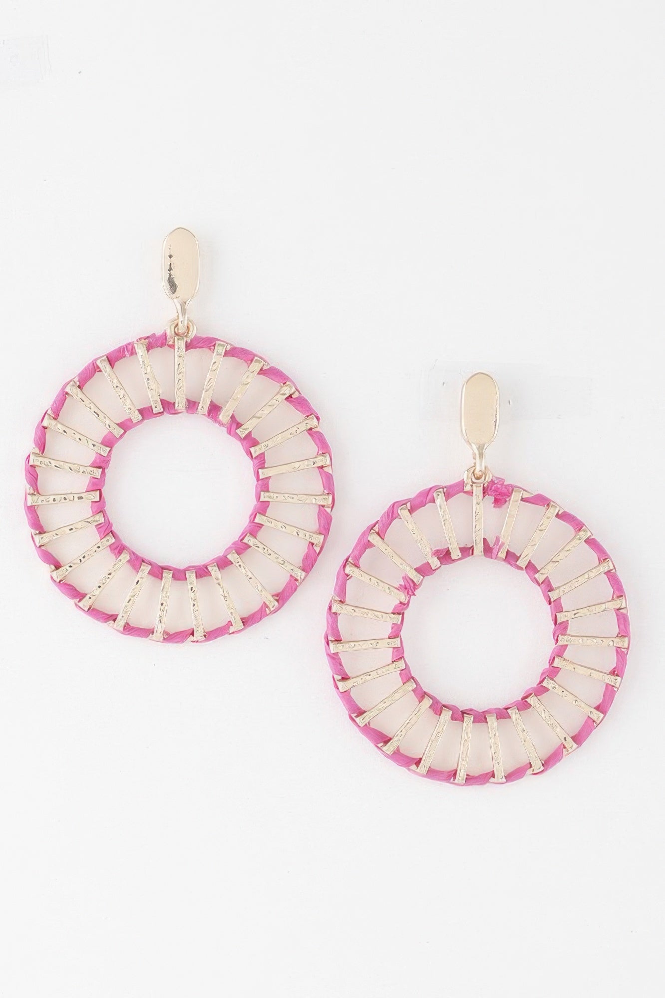 Twisted woven disk earrings in fuchsia with gold tone and cream striped detail