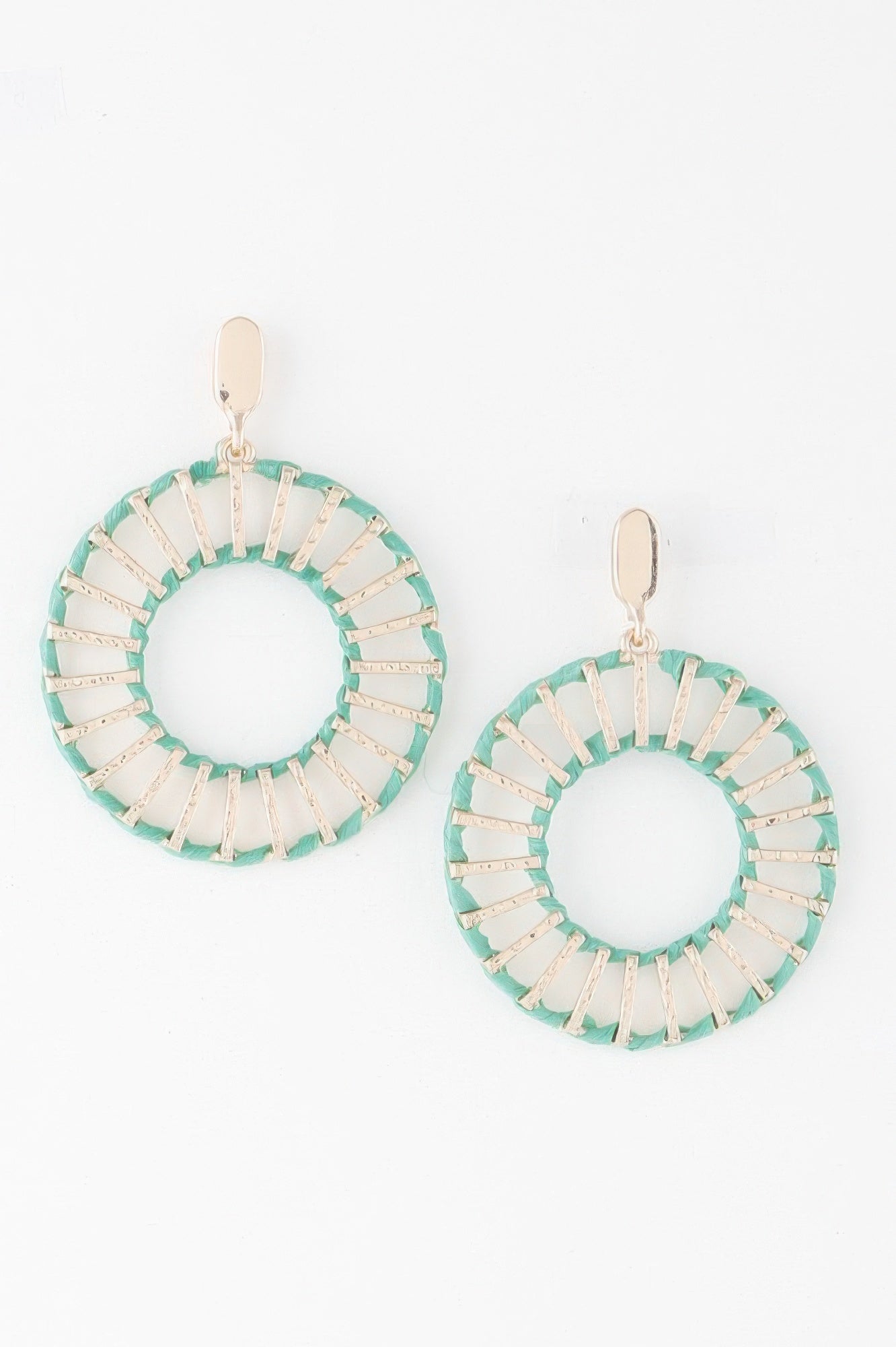 Twisted woven disk earrings in green with gold tone and cream striped detail