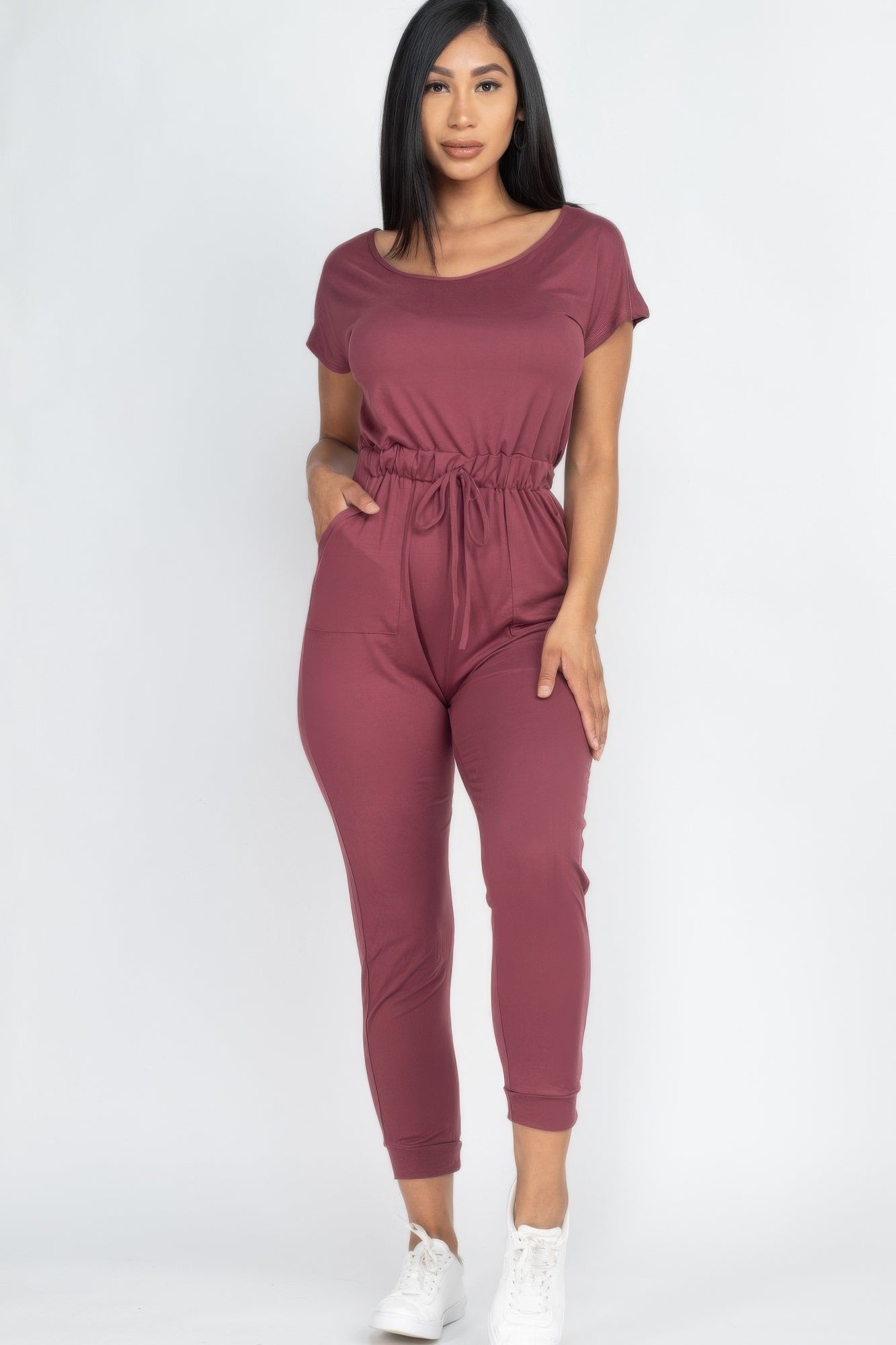 Two-way Shoulder Drawstring Jumpsuit in burgundy with gathered waist and side pocket detail