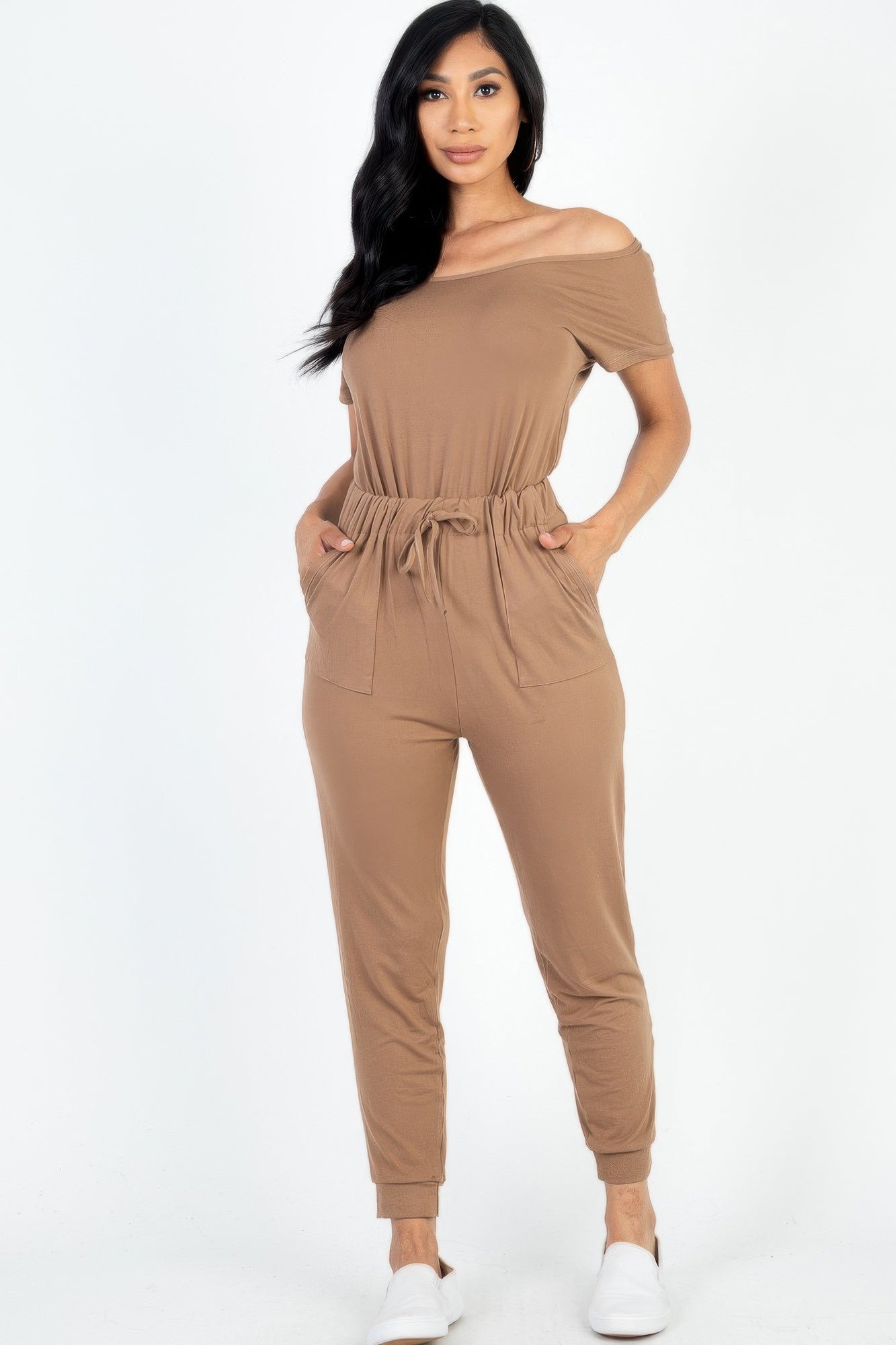 Two-way Shoulder Drawstring Jumpsuit in tan brown with drawstring waist and cuffed hems