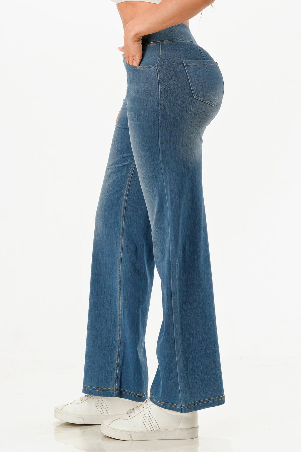 Ultra Soft flare baggy jeans, light wash denim, side-back view with pocket and seams