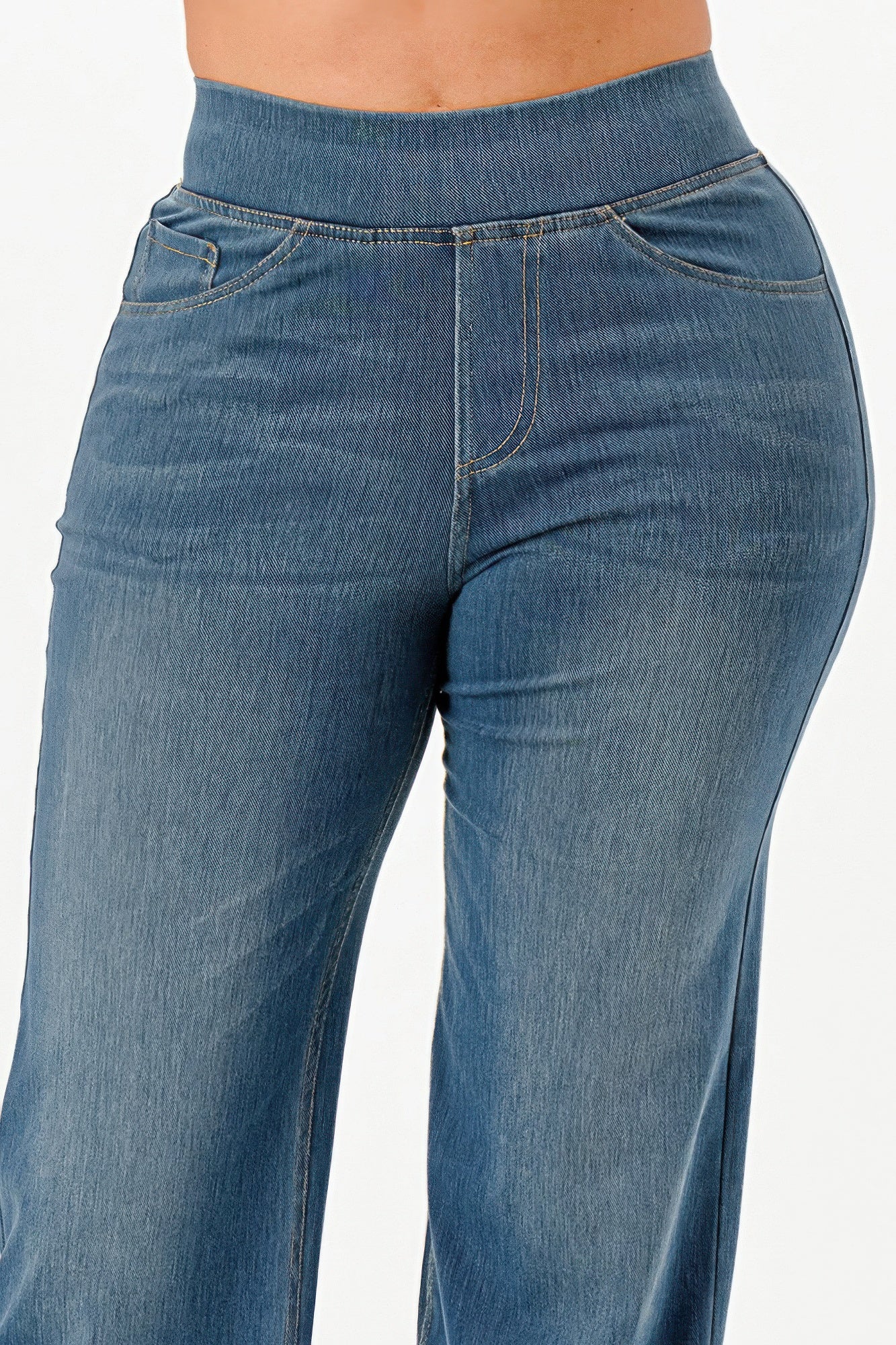 Ultra Soft flare baggy jeans, light wash denim, close-up of high-rise waistband and seams