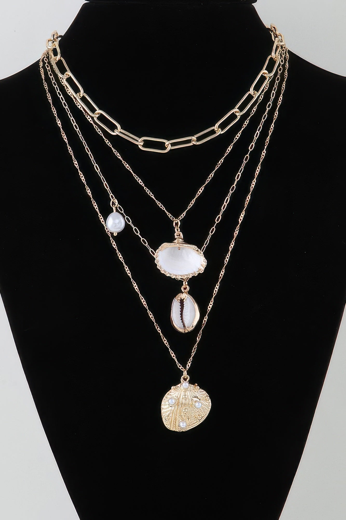 Under The Sea charm chain necklace: gold-tone layered chains with shell charms and drops