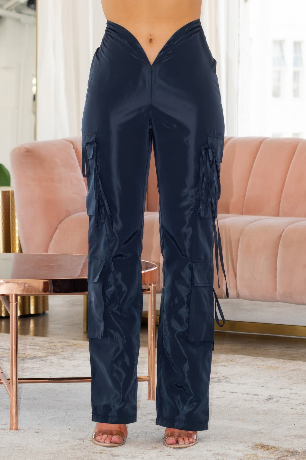 V cut cargo pants, dark navy, cargo pockets on sides, drawstring ties at hems