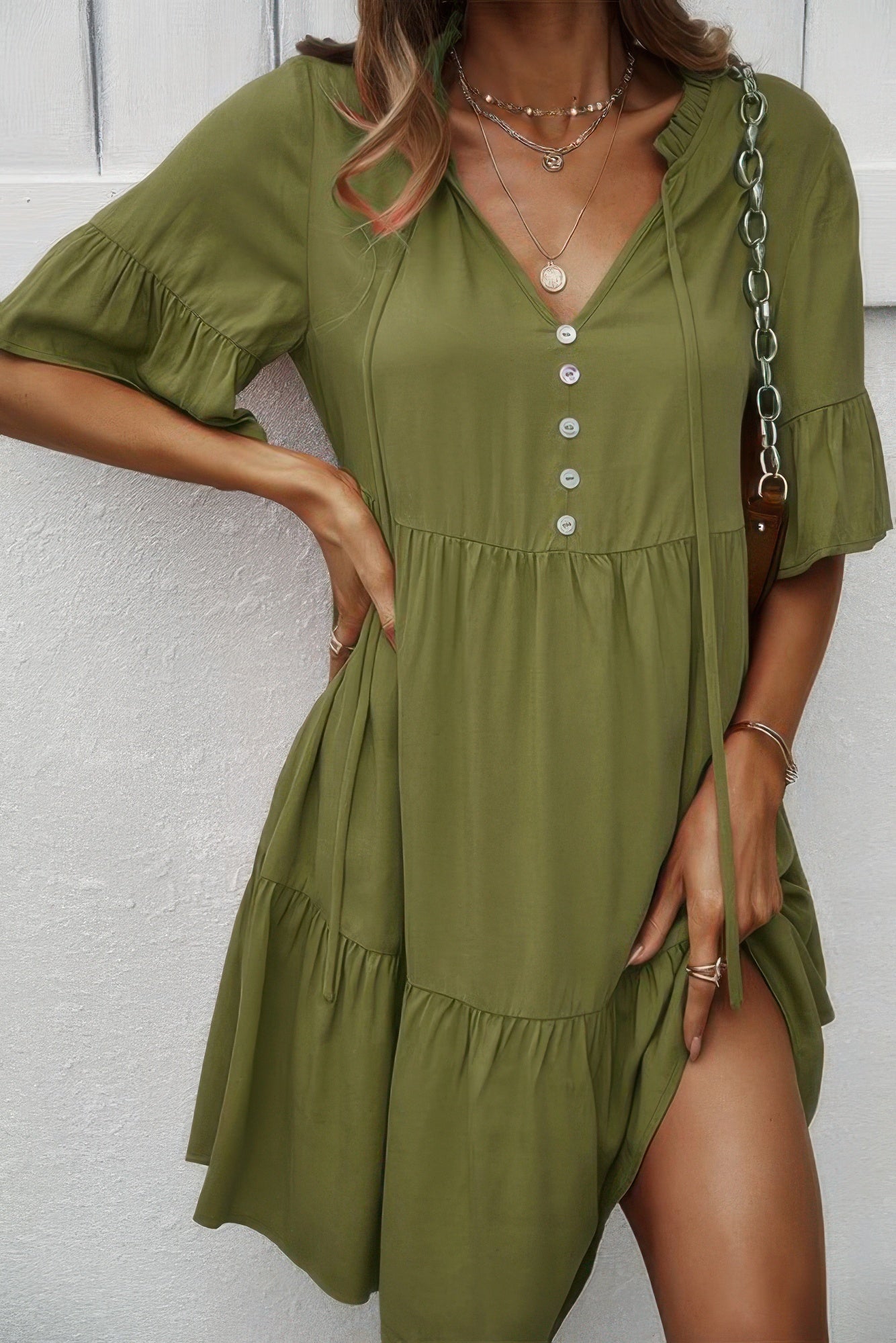 Light green V-neck button-front tiered ruffle dress with short flounce sleeves