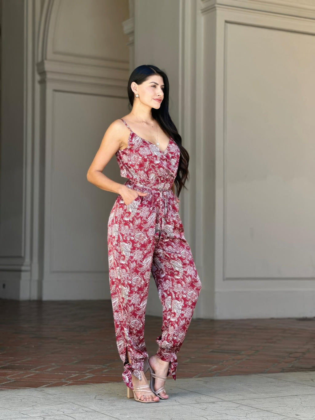 Tie-waist V-neck sleeveless jumpsuit with flowing paisley legs