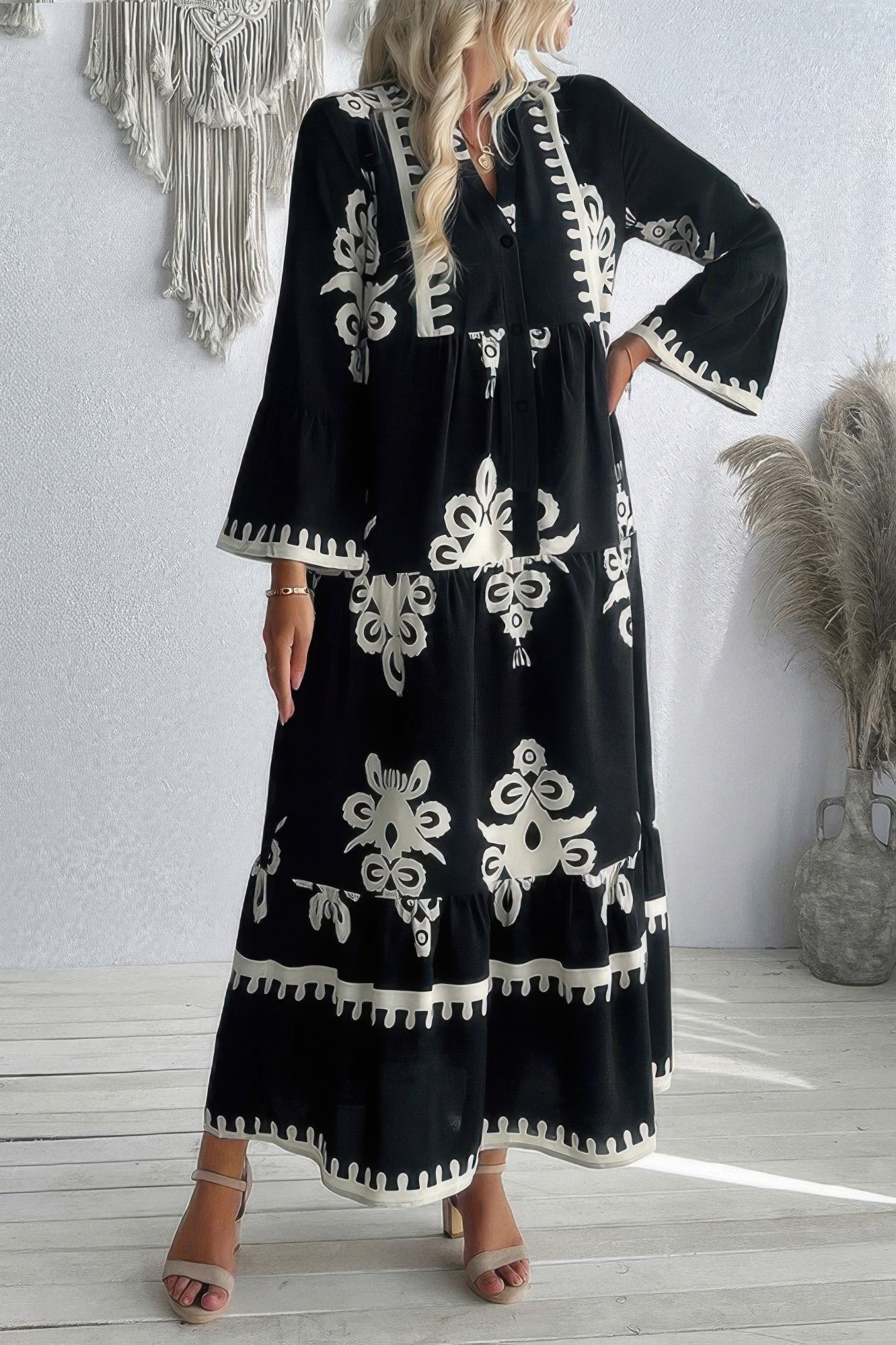 Tigbul's V-neck stand-collar button dress, black with white floral panels and tiered skirt