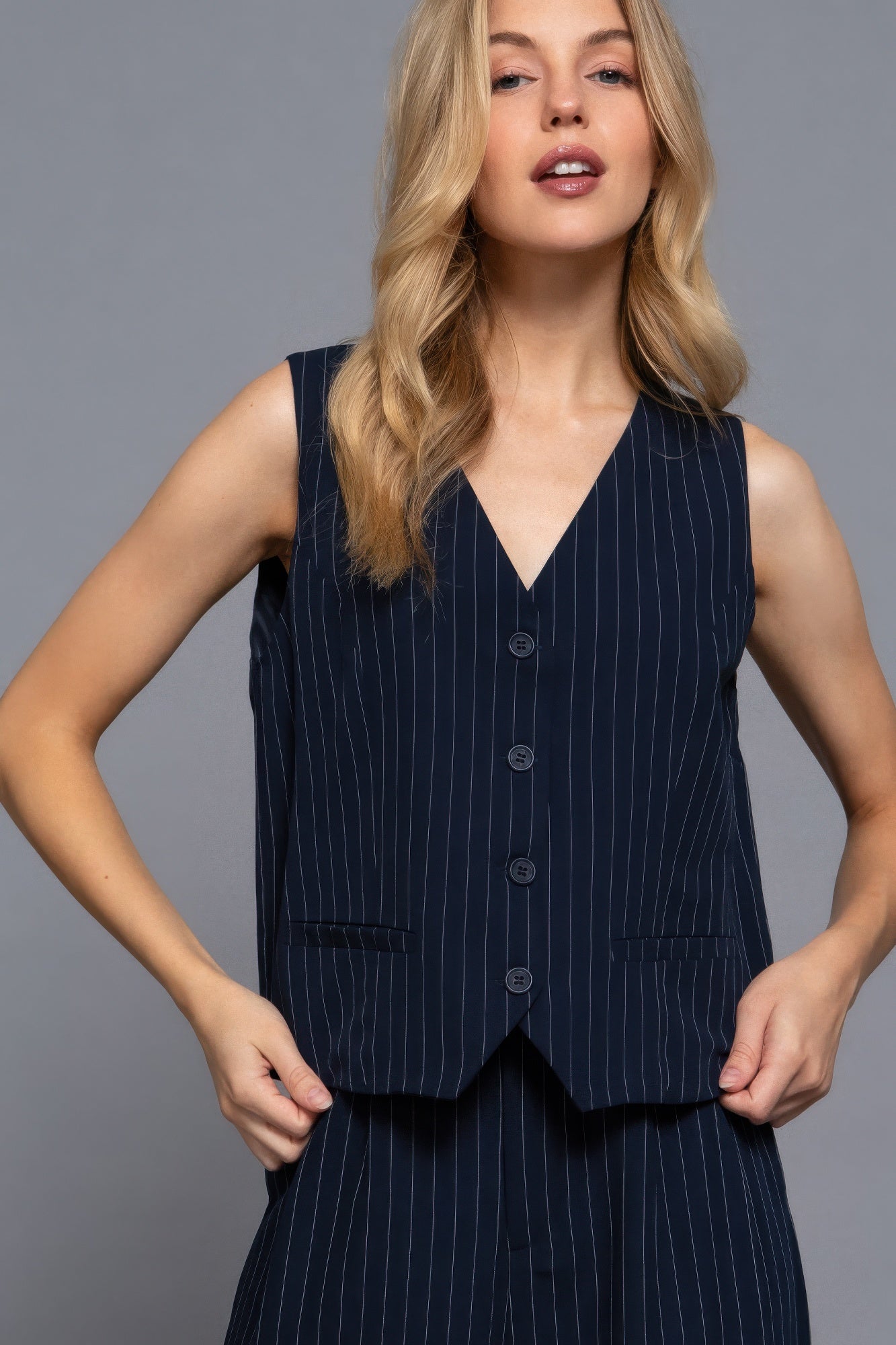 Navy pinstripe V-neck woven vest with button front and chest pocket