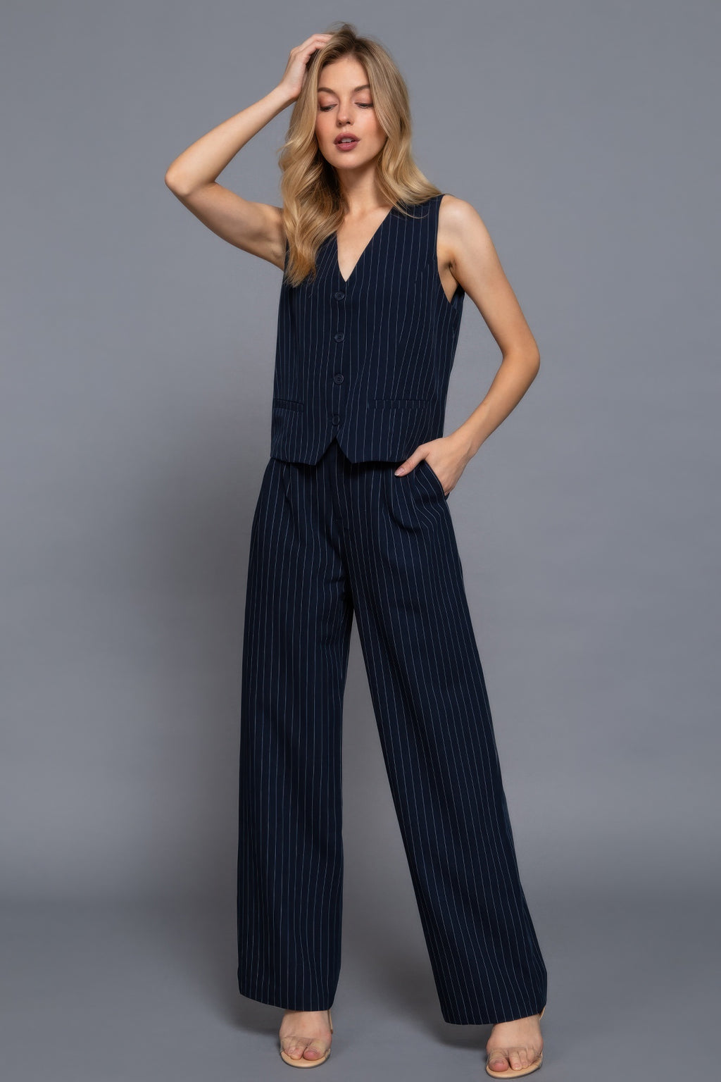 Navy pinstripe sleeveless V-neck button vest with two side pockets